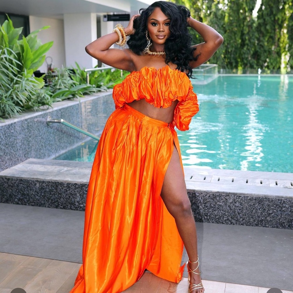 Two piece orange custom skirt set! Size M-L! Has a lot of stretch and a slit